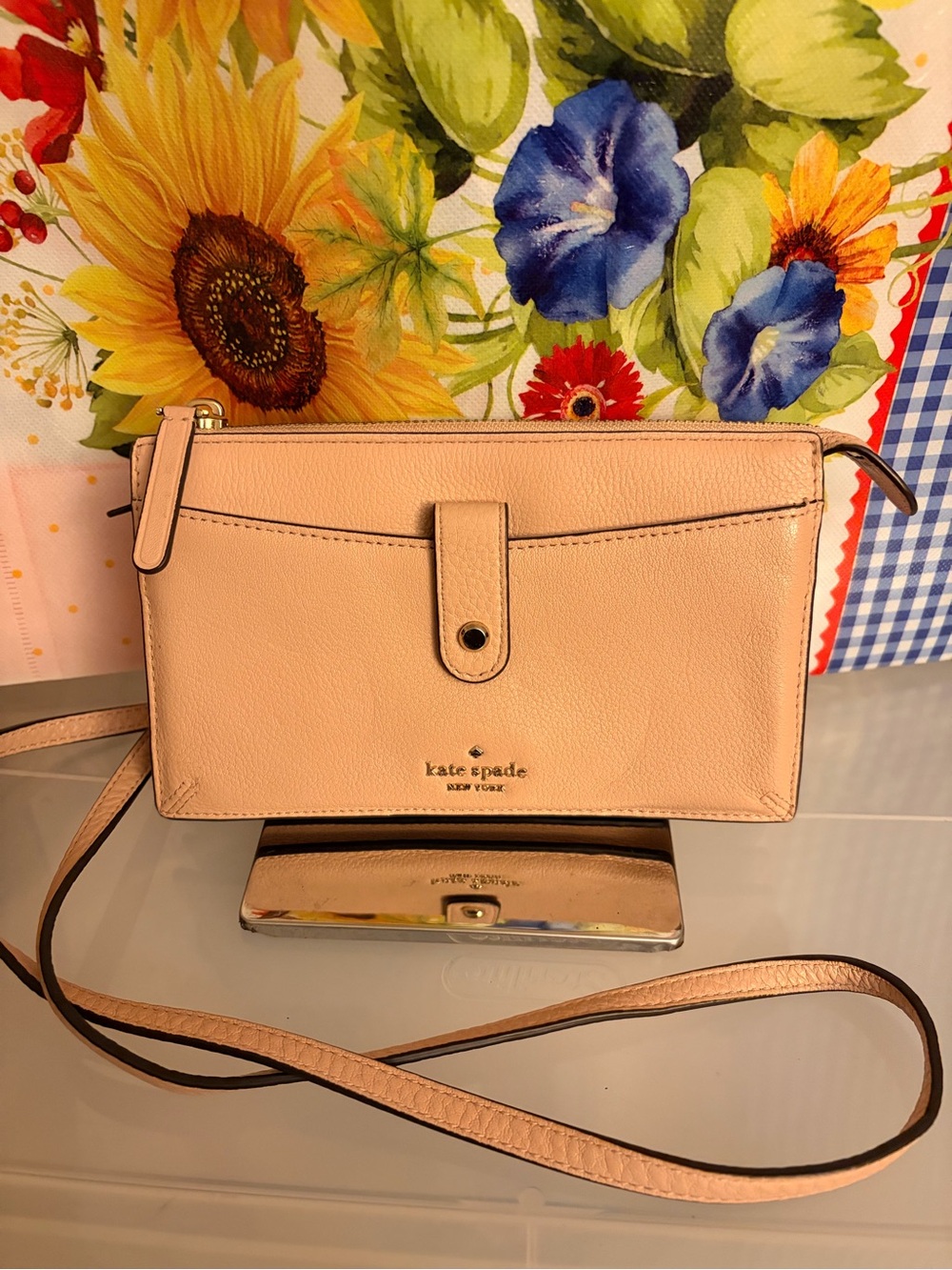 Kate Spade New York blush pink leather crossbody with gold tone front snap